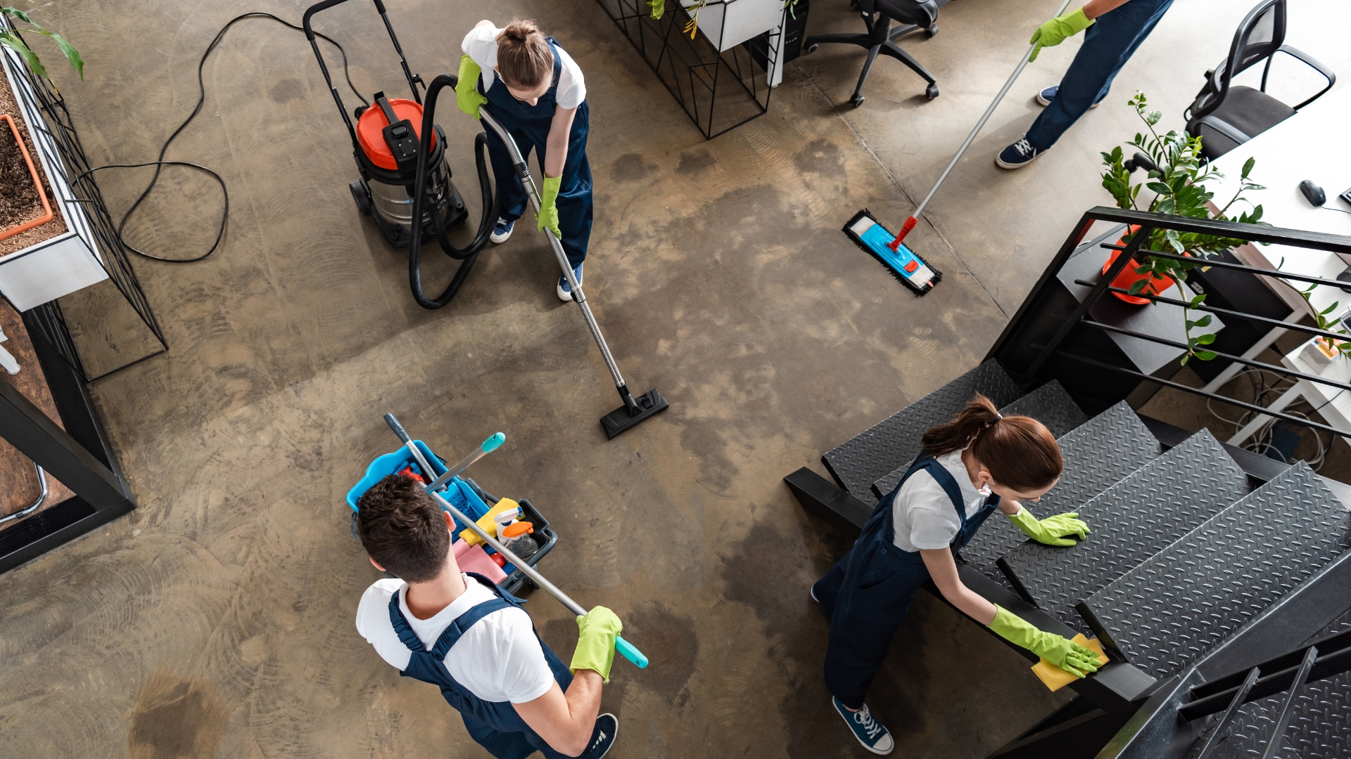 A group of people cleaning a room together